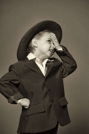 boy in suit and hatの写真素材