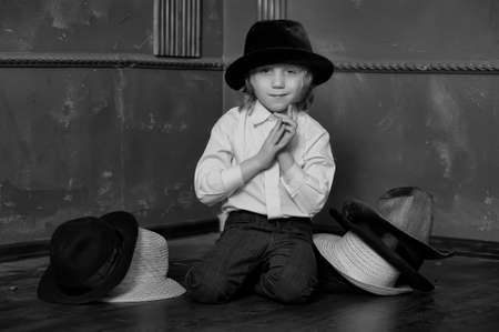 the boy measures at once many hatsの写真素材