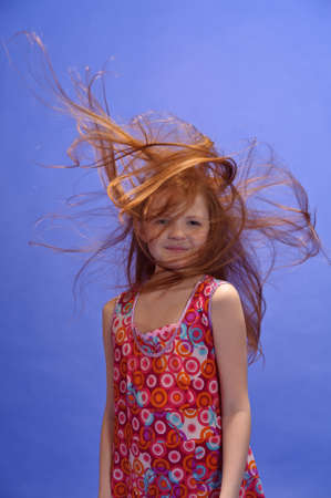 red-haired girl in studioの写真素材