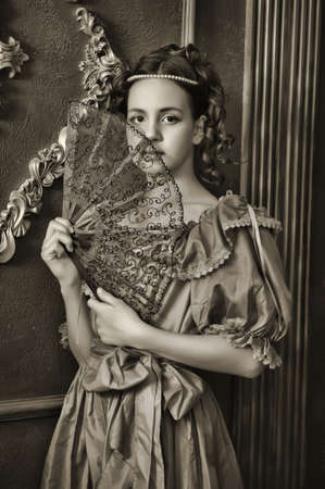 Portrait of the young Victorian girl, he photo is executed in vintage styleの写真素材