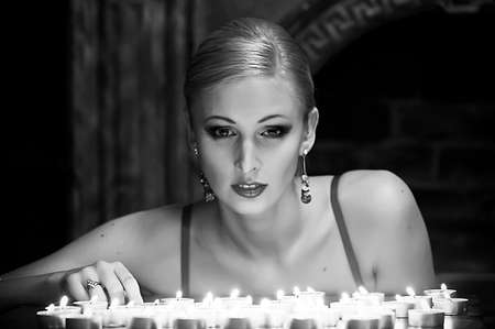 Blonde with candlesの写真素材