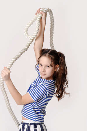 Little girl with a ropeの写真素材