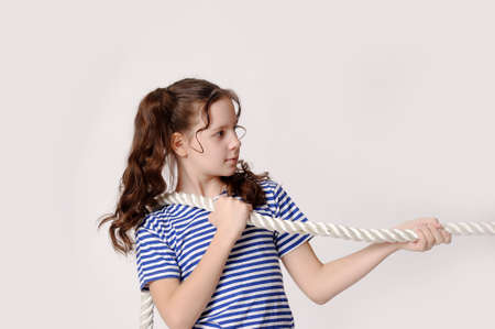 Little girl with a ropeの写真素材