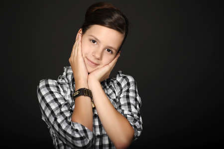 Face and hands of beautiful girlの写真素材