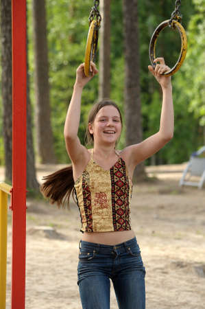 teen girl on the bar sports