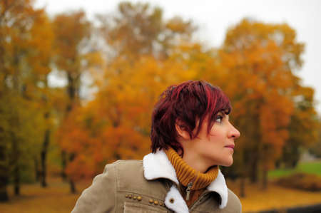 Young woman in autumn parkの写真素材