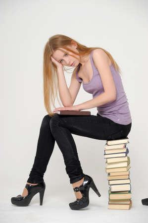 Student with books preparing for exams の写真素材