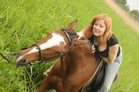 Woman Horse in field or park Woman Horse in field or park