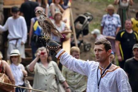 falconers, medieval festival in Vyborg, Russia