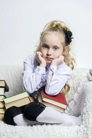 sad girl schoolgirl with books