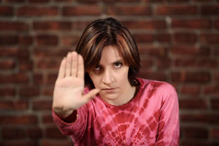 Woman showing stop gesture