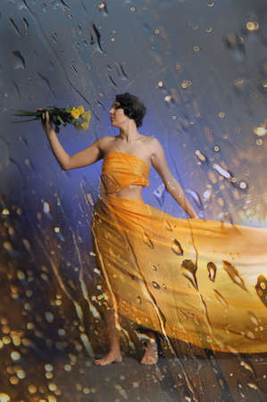 Beautiful young lady with roses
