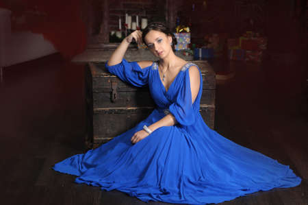 elegant woman in retro style in a blue dressの写真素材