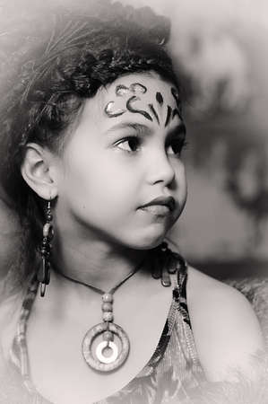 Girl with dreadlocks and clothing ethnic style
