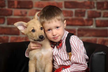 boy with a puppyの写真素材