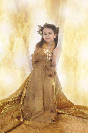 girl in goldの写真素材
