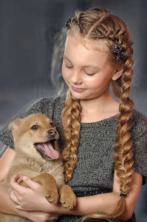 girl with a puppyの写真素材