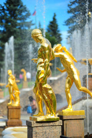 golden statues at Peterhofの写真素材