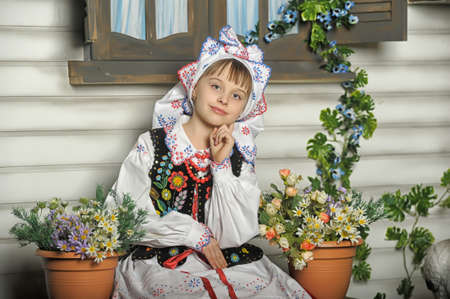 Girl in Polish national costume of Krakowの写真素材