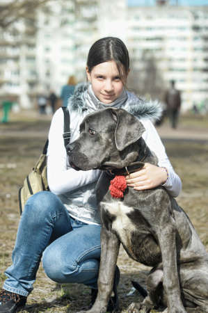 Girl with puppyの写真素材