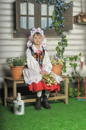 Girl in Polish national costume of Krakowの写真素材