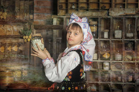 Girl in Polish national costume of Krakowの写真素材