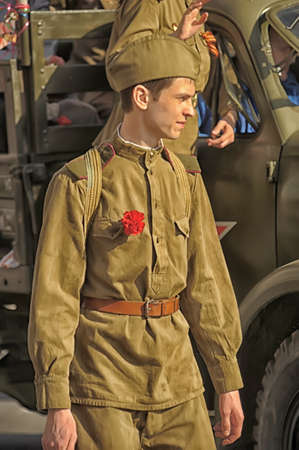 Young people in the form of infantrymen of the Second World War  The parade of veterans of World War II on the Nevsky Prospect, St  Petersburg, Russia, May 9, 2013のeditorial素材