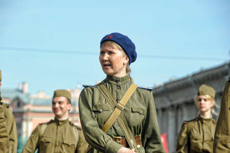 Young people in the form of infantrymen of the Second World War  The parade of veterans of World War II on the Nevsky Prospect, St  Petersburg, Russia, May 9, 2013 のeditorial素材