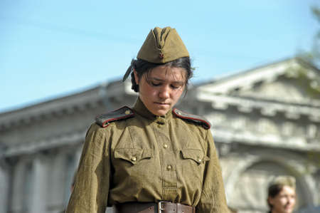 Young people in the form of infantrymen of the Second World War  The parade of veterans of World War II on the Nevsky Prospect, St  Petersburg, Russia, May 9, 2013 のeditorial素材