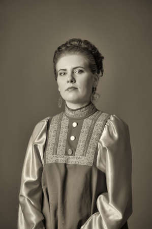 girl in traditional russian folk dressの写真素材