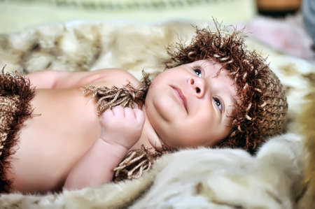Cute little Newborn Baby boy posing for camera 
