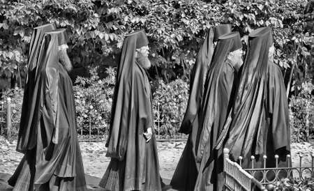 Monks in black are at the service of the church のeditorial素材