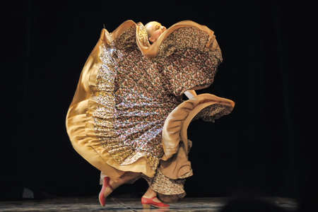Flamenco dance on stage  Beautiful gypsy dancers performing a traditional dance 