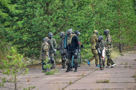 People playing paintball gameのeditorial素材