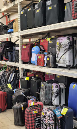 Rack with suitcases in supermarket のeditorial素材