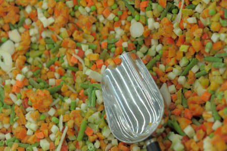 Background of frozen raw vegetables