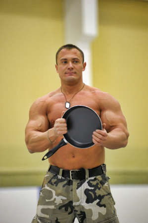 Russian strongman bodybuilder oppression hands pan のeditorial素材