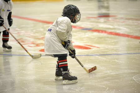 Children playing hockey on a city tournament St  Petersburg, Russia のeditorial素材