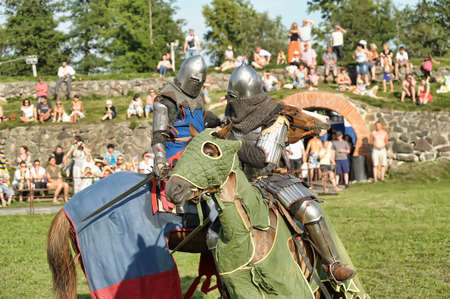 Knight on horse tournaments historic festival, fortress Corell, Priozersk, Russia のeditorial素材