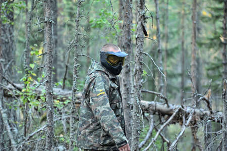 Paintball players in full gear at the shooting range, tournament in St  Petersburg, Russia のeditorial素材