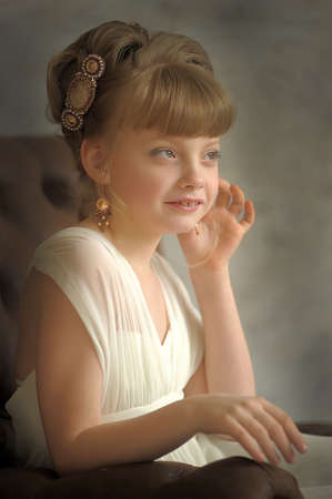 Girl in a white dress and a beautiful necklaceの写真素材