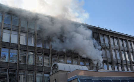 Fire in a highrise building with glass facade のeditorial素材