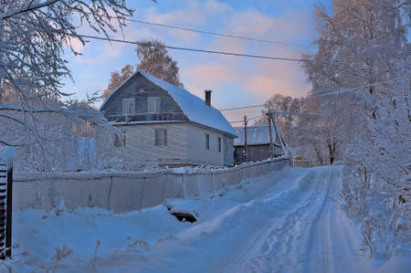 beautiful winter landscape with snow-covered homeのeditorial素材