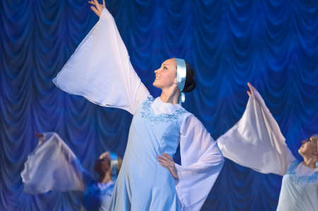 girls in white dresses dancing on stage, Russian national dance festival for children and youth dance groups, St  Petersburg, Russiaのeditorial素材