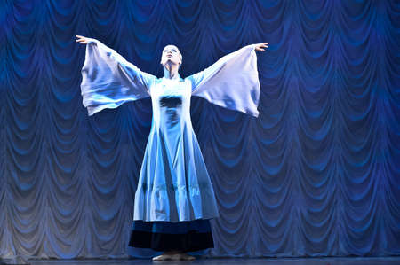 girls in white dresses dancing on stage, Russian national dance festival for children and youth...