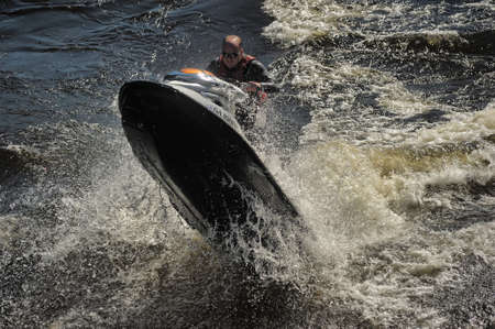 Dives Man on jet-ski