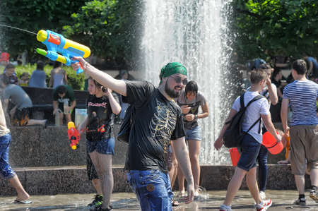 People pour water on each other, Water Battle, Peerburg, Russiaのeditorial素材