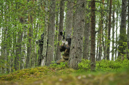 People playing paintball gameのeditorial素材