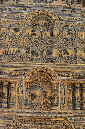 Blue white paintings on a tiled stoveの写真素材