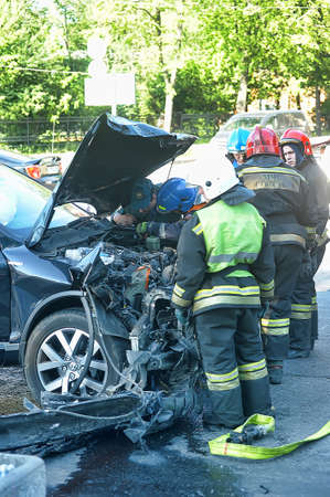Rescuers and FEMA had an accident around the car, Petersburg, Russia.